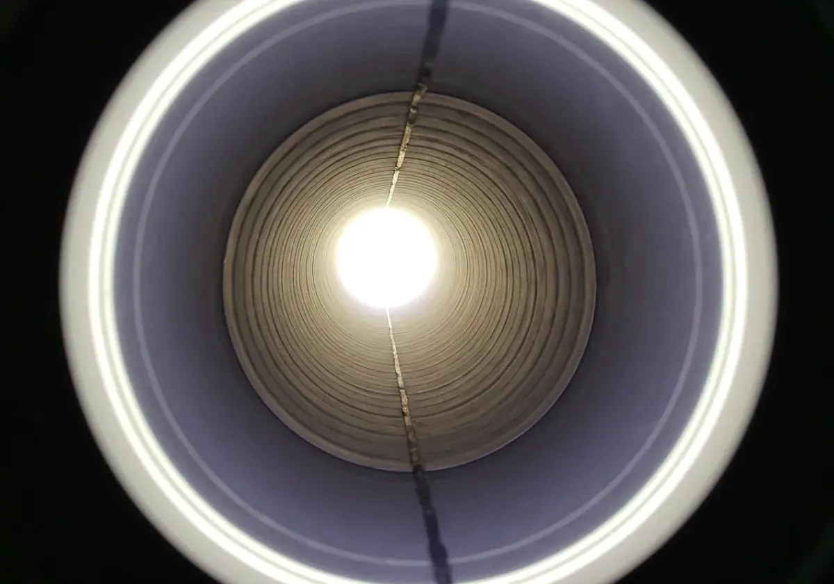 After — chimney inspection: A camera run up the flue surfaces the damage no glance from the hearth could find.